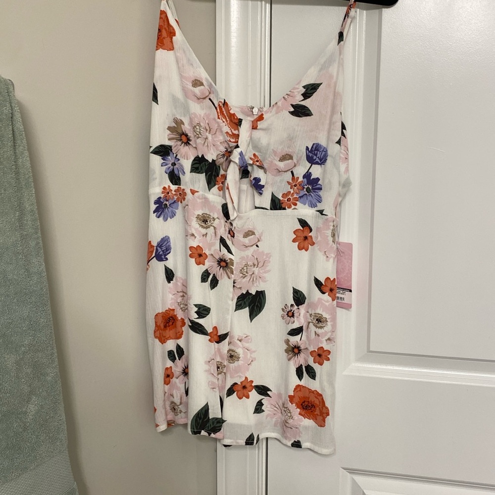 Quite storm floral romper never worn